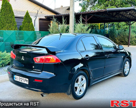 Чорний Міцубісі Lancer, об'ємом двигуна 2 л та пробігом 240 тис. км за 5900 $, фото 3 на Automoto.ua