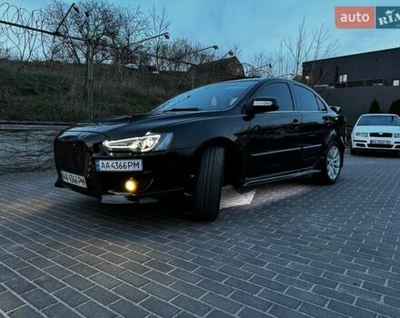 Черный Мицубиси Лансер, объемом двигателя 2 л и пробегом 240 тыс. км за 10000 $, фото 11 на Automoto.ua