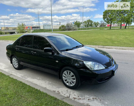 Чорний Міцубісі Lancer, об'ємом двигуна 1.6 л та пробігом 103 тис. км за 4300 $, фото 6 на Automoto.ua