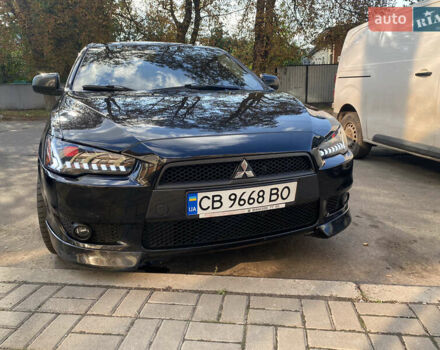 Черный Мицубиси Лансер, объемом двигателя 2 л и пробегом 86 тыс. км за 10000 $, фото 22 на Automoto.ua