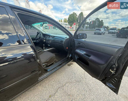 Чорний Міцубісі Lancer, об'ємом двигуна 1.6 л та пробігом 292 тис. км за 3600 $, фото 10 на Automoto.ua