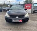 Мицубиси Лансер 2008 в Запорожье на Automoto.ua Черный Мицубиси Лансер, объемом двигателя 1.6 л и пробегом 316 тыс. км за 4290 $, фото 1 на Automoto.ua