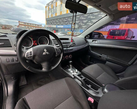 Черный Мицубиси Лансер, объемом двигателя 2 л и пробегом 236 тыс. км за 7950 $, фото 7 на Automoto.ua