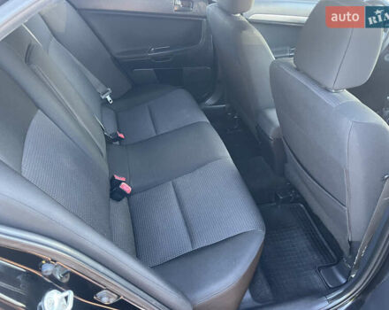 Черный Мицубиси Лансер, объемом двигателя 1.5 л и пробегом 263 тыс. км за 5300 $, фото 6 на Automoto.ua