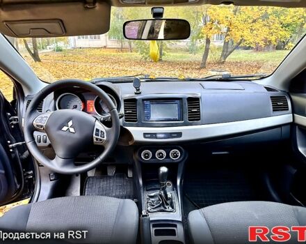 Чорний Міцубісі Lancer, об'ємом двигуна 2 л та пробігом 245 тис. км за 5500 $, фото 9 на Automoto.ua