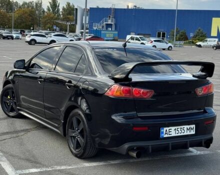 Черный Мицубиси Лансер, объемом двигателя 2 л и пробегом 297 тыс. км за 7500 $, фото 4 на Automoto.ua