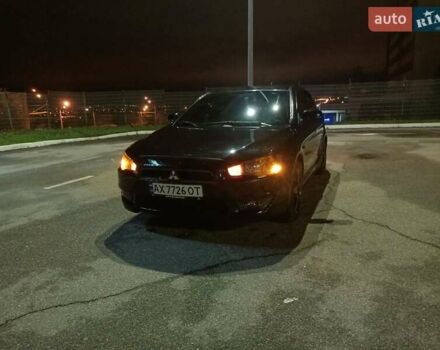 Черный Мицубиси Лансер, объемом двигателя 2 л и пробегом 240 тыс. км за 6400 $, фото 19 на Automoto.ua