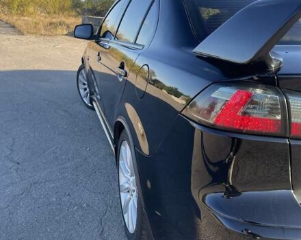 Чорний Міцубісі Lancer, об'ємом двигуна 2 л та пробігом 223 тис. км за 7800 $, фото 8 на Automoto.ua