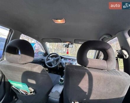 Чорний Міцубісі Lancer, об'ємом двигуна 1.6 л та пробігом 310 тис. км за 3500 $, фото 44 на Automoto.ua