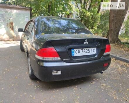 Чорний Міцубісі Lancer, об'ємом двигуна 1.6 л та пробігом 335 тис. км за 3100 $, фото 10 на Automoto.ua