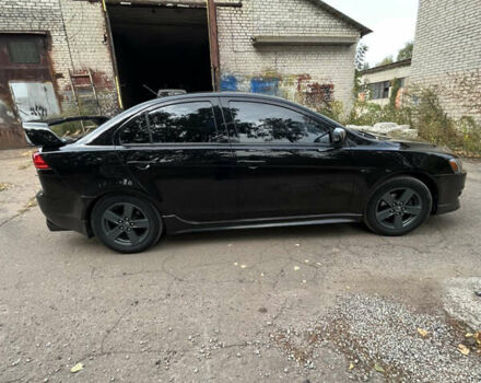 Мицубиси Лансер 2008 в Чернигове на Automoto.ua Черный Мицубиси Лансер, объемом двигателя 2 л и пробегом 254 тыс. км за 7500 $, фото 4 на Automoto.ua