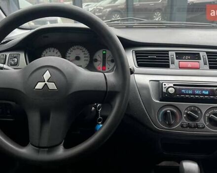 Чорний Міцубісі Lancer, об'ємом двигуна 1.6 л та пробігом 340 тис. км за 6190 $, фото 13 на Automoto.ua