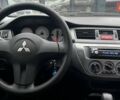 Чорний Міцубісі Lancer, об'ємом двигуна 1.6 л та пробігом 340 тис. км за 6190 $, фото 13 на Automoto.ua
