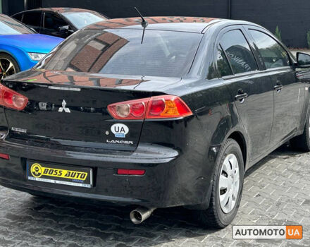 Черный Мицубиси Лансер, объемом двигателя 1.5 л и пробегом 93 тыс. км за 7000 $, фото 5 на Automoto.ua