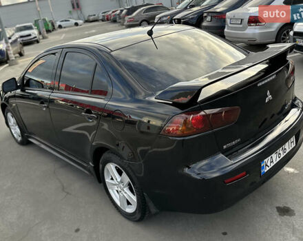 Чорний Міцубісі Lancer, об'ємом двигуна 2 л та пробігом 290 тис. км за 5900 $, фото 15 на Automoto.ua