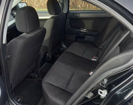 Чорний Міцубісі Lancer, об'ємом двигуна 1.5 л та пробігом 160 тис. км за 5850 $, фото 11 на Automoto.ua