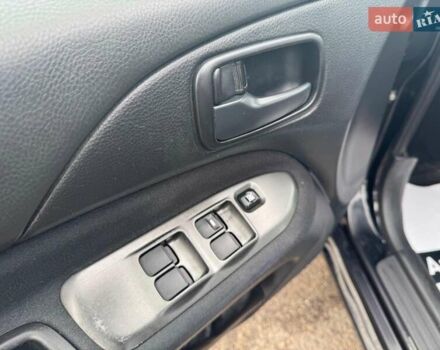 Мицубиси Лансер 2008 в Запорожье на Automoto.ua Черный Мицубиси Лансер, объемом двигателя 1.6 л и пробегом 316 тыс. км за 4290 $, фото 14 на Automoto.ua