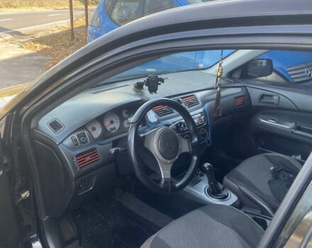 Мицубиси Лансер 2008 в Киеве на Automoto.ua Черный Мицубиси Лансер, объемом двигателя 1.6 л и пробегом 72 тыс. км за 2650 $, фото 8 на Automoto.ua