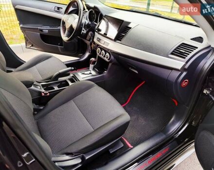 Чорний Міцубісі Lancer, об'ємом двигуна 2 л та пробігом 175 тис. км за 7800 $, фото 13 на Automoto.ua