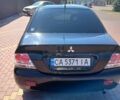 Черный Мицубиси Лансер, объемом двигателя 1.6 л и пробегом 409 тыс. км за 3000 $, фото 4 на Automoto.ua