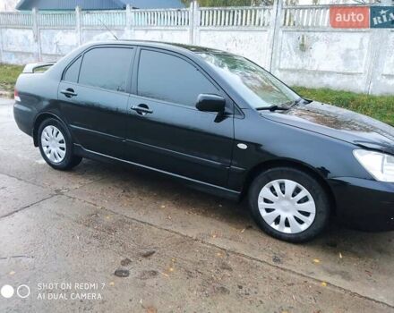 Мицубиси Лансер 2008 в Прилуках на Automoto.ua Черный Мицубиси Лансер, объемом двигателя 1.58 л и пробегом 219 тыс. км за 4900 $, фото 8 на Automoto.ua