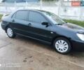Мицубиси Лансер 2008 в Прилуках на Automoto.ua Черный Мицубиси Лансер, объемом двигателя 1.58 л и пробегом 219 тыс. км за 4900 $, фото 8 на Automoto.ua