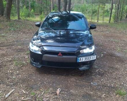 Чорний Міцубісі Lancer, об'ємом двигуна 2 л та пробігом 150 тис. км за 7600 $, фото 13 на Automoto.ua