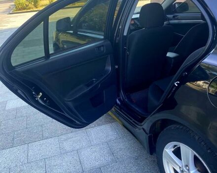 Чорний Міцубісі Lancer, об'ємом двигуна 2 л та пробігом 220 тис. км за 6300 $, фото 5 на Automoto.ua