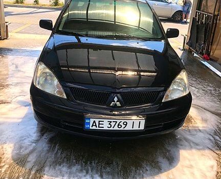 Чорний Міцубісі Lancer, об'ємом двигуна 1.6 л та пробігом 245 тис. км за 3200 $, фото 4 на Automoto.ua