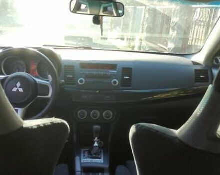 Чорний Міцубісі Lancer, об'ємом двигуна 2 л та пробігом 134 тис. км за 29034 $, фото 8 на Automoto.ua
