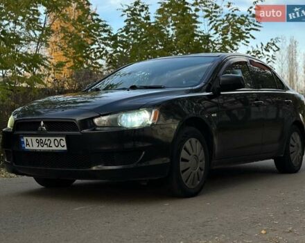 Черный Мицубиси Лансер, объемом двигателя 1.5 л и пробегом 285 тыс. км за 4800 $, фото 13 на Automoto.ua