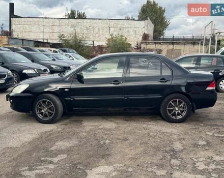 Мицубиси Лансер 2008 в Запорожье на Automoto.ua Черный Мицубиси Лансер, объемом двигателя 1.6 л и пробегом 316 тыс. км за 4290 $, фото 2 на Automoto.ua