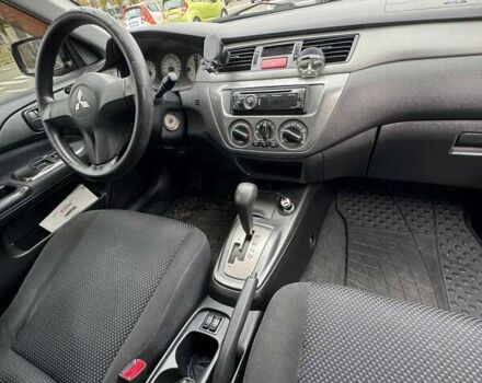 Чорний Міцубісі Lancer, об'ємом двигуна 1.6 л та пробігом 245 тис. км за 4500 $, фото 20 на Automoto.ua