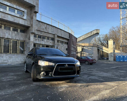 Черный Мицубиси Лансер, объемом двигателя 2 л и пробегом 236 тыс. км за 6450 $, фото 3 на Automoto.ua