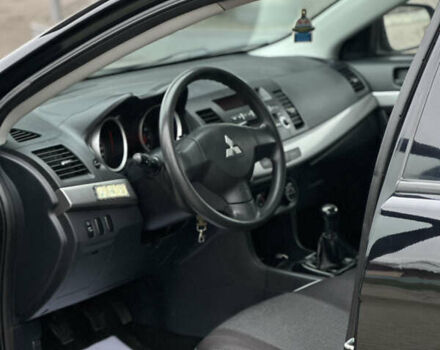 Чорний Міцубісі Lancer, об'ємом двигуна 1.5 л та пробігом 111 тис. км за 6999 $, фото 37 на Automoto.ua