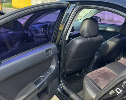 Чорний Міцубісі Lancer, об'ємом двигуна 1.5 л та пробігом 210 тис. км за 5500 $, фото 25 на Automoto.ua
