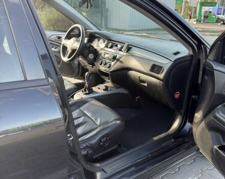 Чорний Міцубісі Lancer, об'ємом двигуна 1.6 л та пробігом 364 тис. км за 3000 $, фото 9 на Automoto.ua