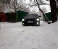 Чорний Міцубісі Lancer, об'ємом двигуна 2 л та пробігом 21 тис. км за 7300 $, фото 2 на Automoto.ua