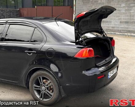 Черный Мицубиси Лансер, объемом двигателя 1.5 л и пробегом 250 тыс. км за 6700 $, фото 7 на Automoto.ua