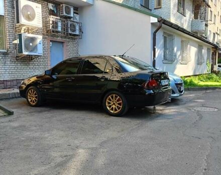Мицубиси Лансер 2008 в Львове на Automoto.ua Черный Мицубиси Лансер, объемом двигателя 1.58 л и пробегом 200 тыс. км за 5200 $, фото 12 на Automoto.ua