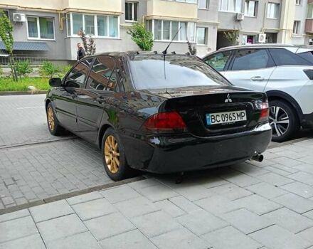 Мицубиси Лансер 2008 в Львове на Automoto.ua Черный Мицубиси Лансер, объемом двигателя 1.58 л и пробегом 200 тыс. км за 5200 $, фото 194 на Automoto.ua