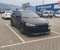 Чорний Міцубісі Lancer, об'ємом двигуна 2 л та пробігом 160 тис. км за 7000 $, фото 1 на Automoto.ua