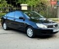 Черный Мицубиси Лансер, объемом двигателя 1.58 л и пробегом 280 тыс. км за 4350 $, фото 8 на Automoto.ua