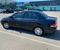 Чорний Міцубісі Lancer, об'ємом двигуна 1.6 л та пробігом 229 тис. км за 4200 $, фото 2 на Automoto.ua