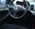 Черный Мицубиси Лансер, объемом двигателя 1.5 л и пробегом 177 тыс. км за 5100 $, фото 9 на Automoto.ua