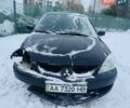 Черный Мицубиси Лансер, объемом двигателя 1.6 л и пробегом 179 тыс. км за 2700 $, фото 1 на Automoto.ua