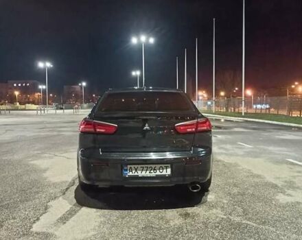 Черный Мицубиси Лансер, объемом двигателя 2 л и пробегом 240 тыс. км за 6400 $, фото 4 на Automoto.ua