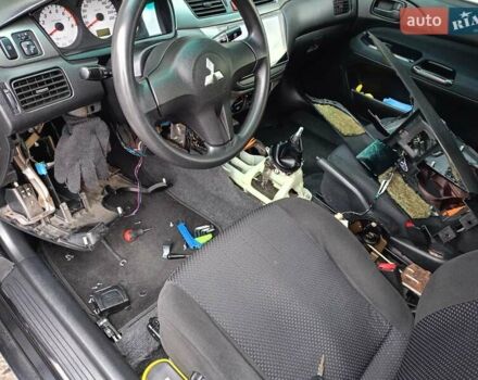 Мицубиси Лансер 2008 в Львове на Automoto.ua Черный Мицубиси Лансер, объемом двигателя 1.58 л и пробегом 200 тыс. км за 5200 $, фото 41 на Automoto.ua