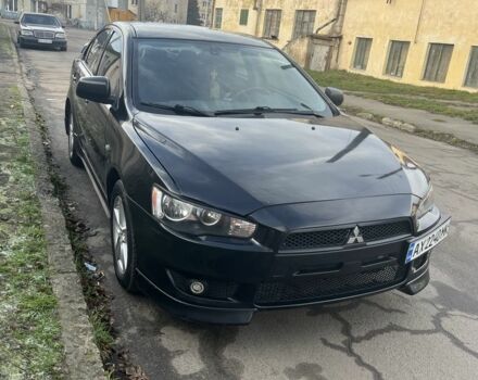 Черный Мицубиси Лансер, объемом двигателя 2 л и пробегом 270 тыс. км за 5600 $, фото 5 на Automoto.ua