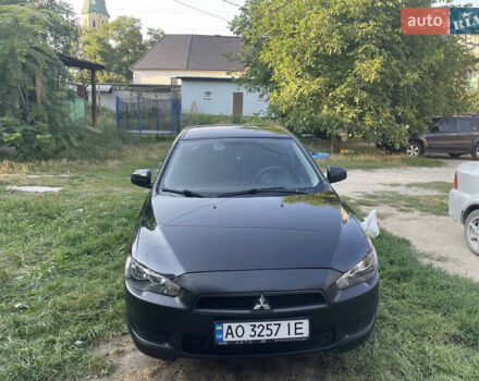 Черный Мицубиси Лансер, объемом двигателя 1.5 л и пробегом 270 тыс. км за 6300 $, фото 1 на Automoto.ua